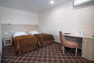 Отель Жемчужина Отель Владивосток Стандартный двухместный номер с 2 отдельными кроватями-2